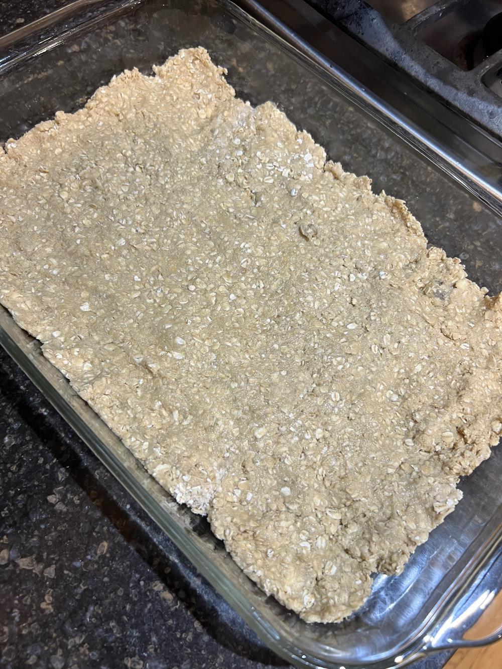 Gluten Free Fudge Bar Recipe Crust in glass pan