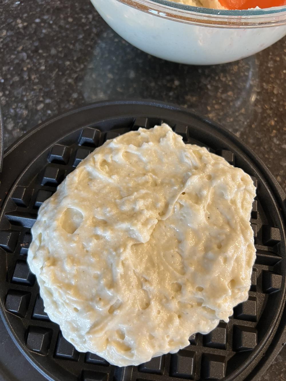 waffle cooking on waffle maker