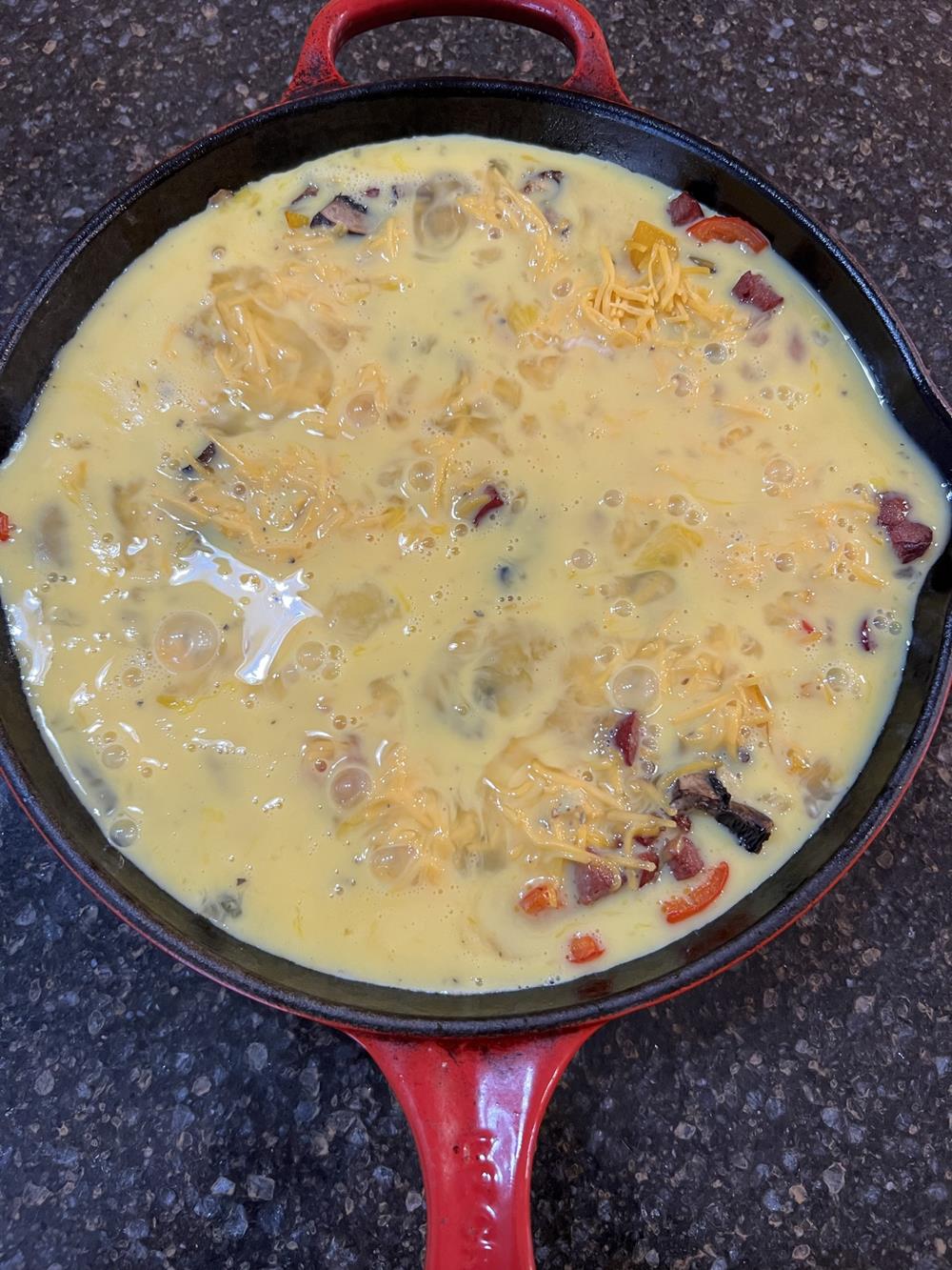 unbaked frittata in skillet