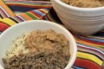 Cheesy Pinto Beans Rice Bowl in white bowl