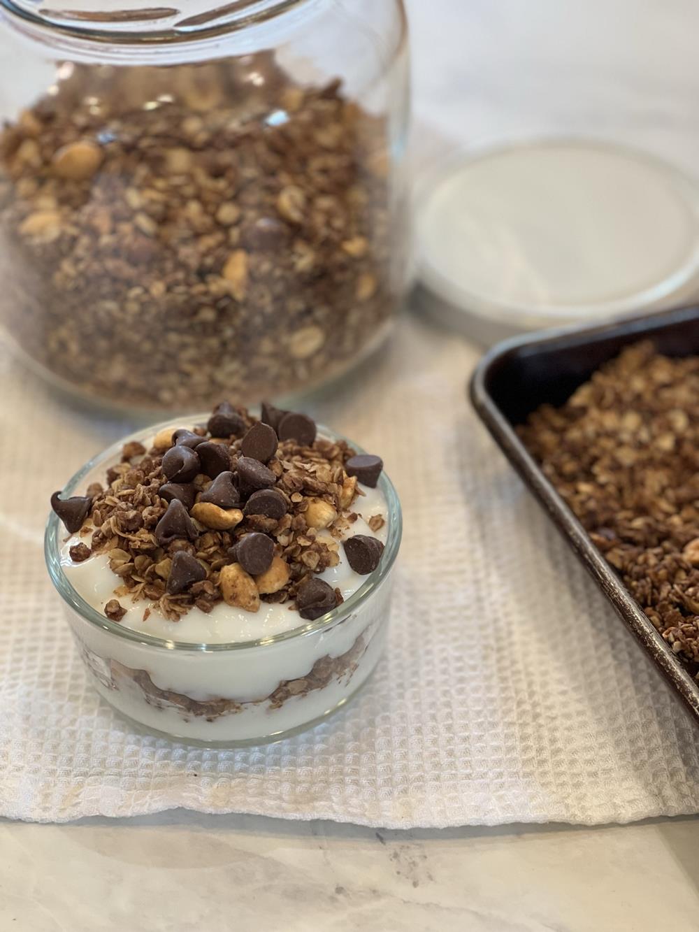 homemade granola in a bowl with yogurt