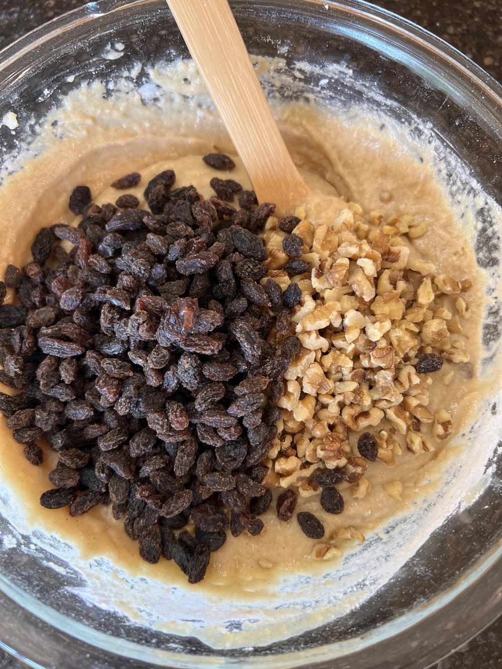 Applesauce Batter with Raisins in glass bowl