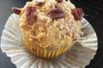 gluten free pumpkin muffin with pecans on top