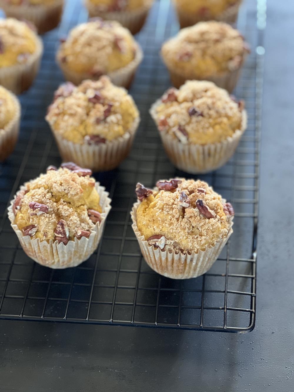 pecan pumpkin muffins on cooling rack