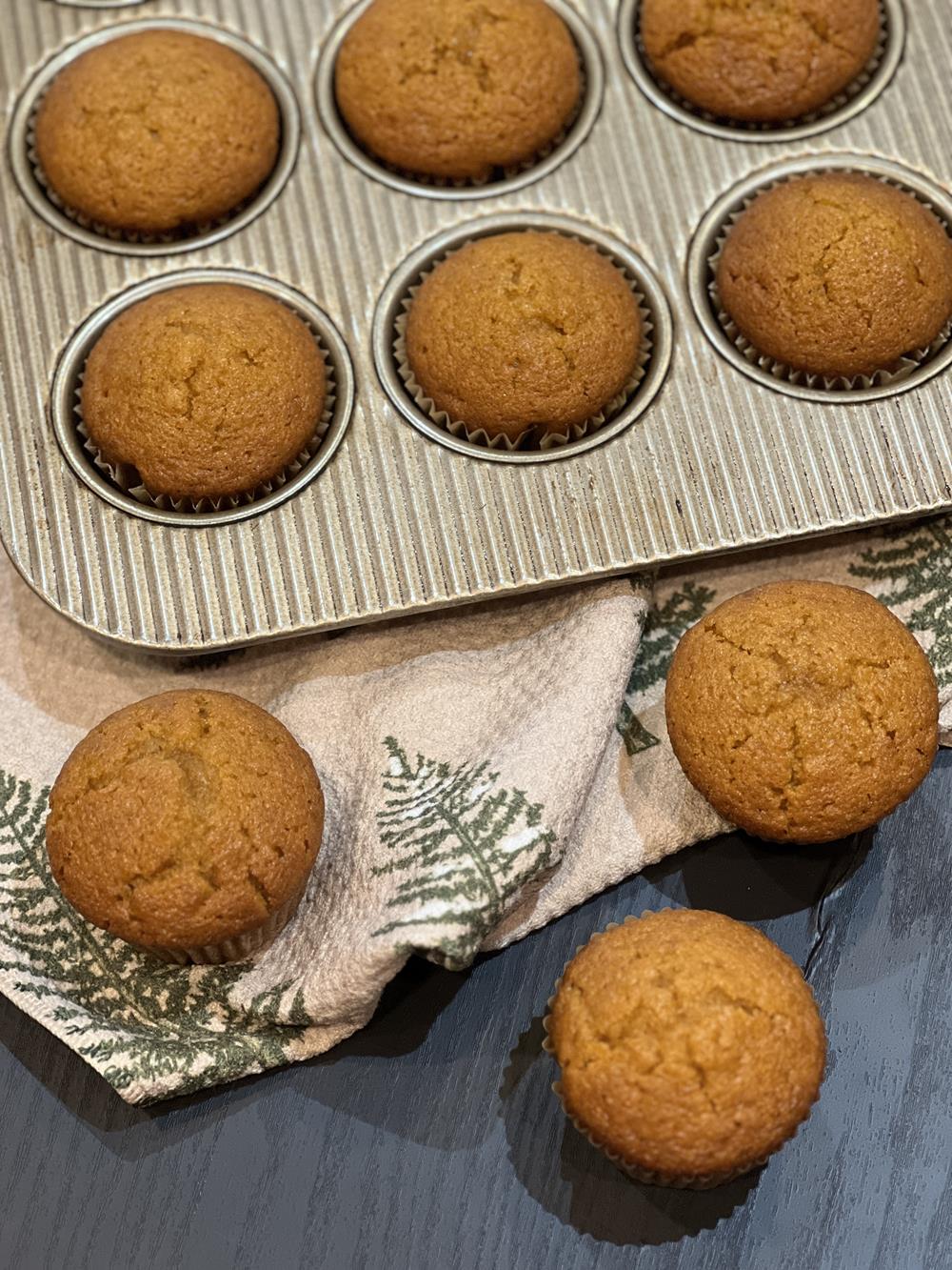 the best pumpkin muffin with green and tan napkin and muffin tin