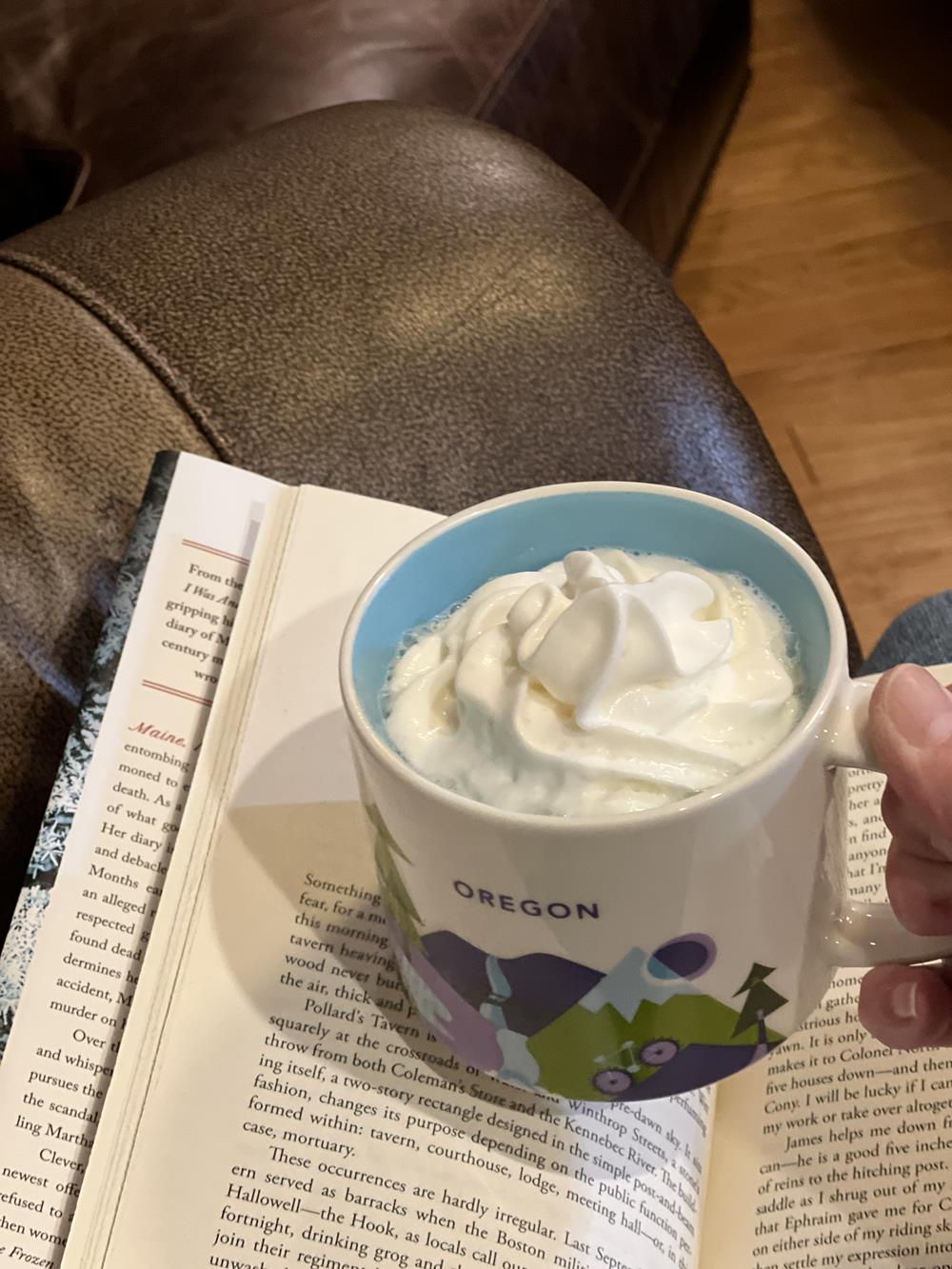 book and cup of hot chocolate