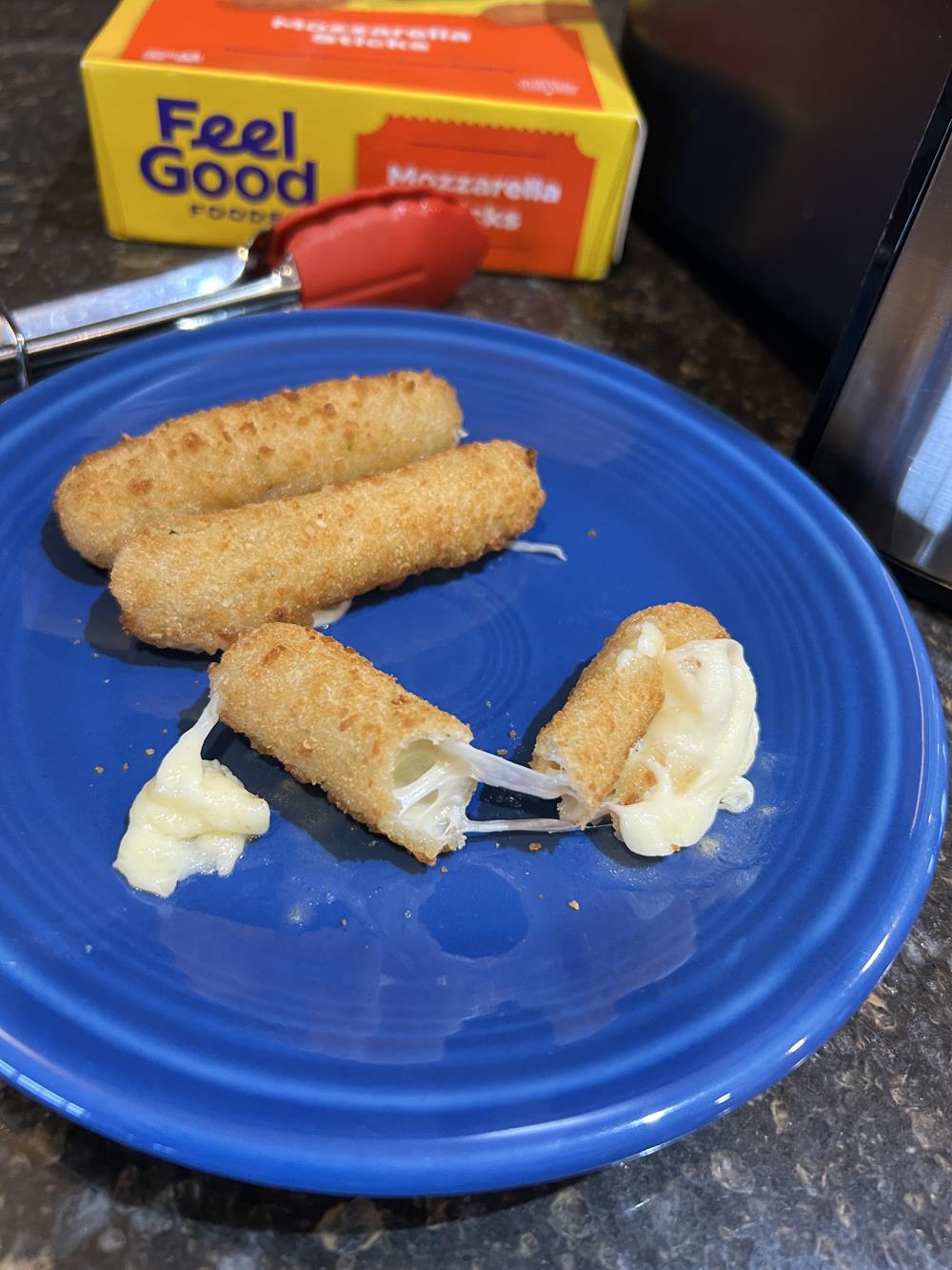 Feel Good Gluten Free Mozzarella Sticks on blue plate