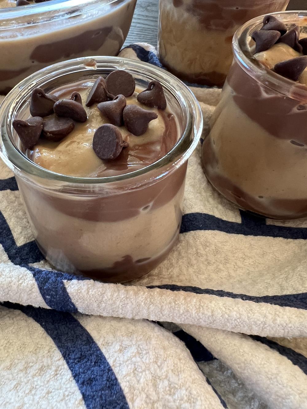 chocolate and peanut butter pudding in a glass bowl