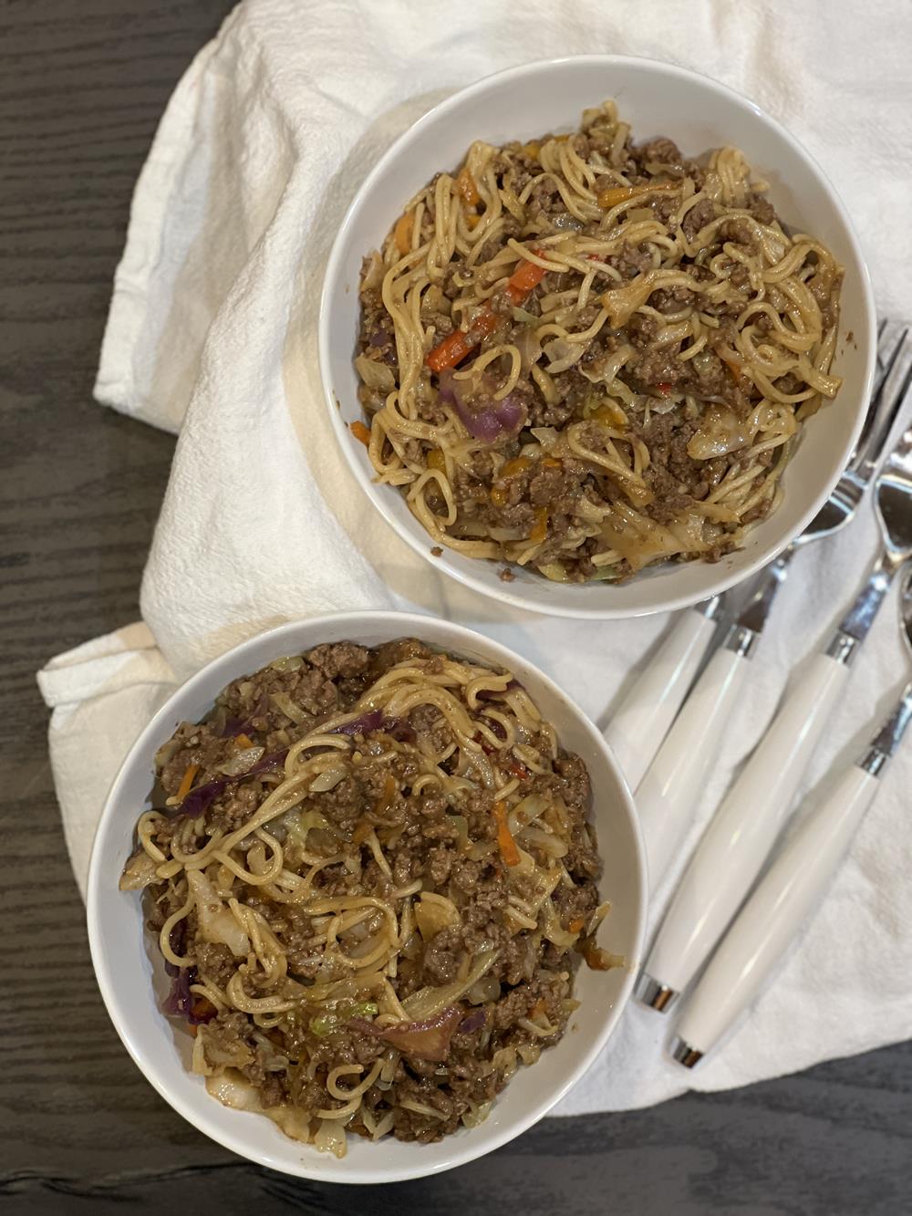 ramen stir fry in white bowls