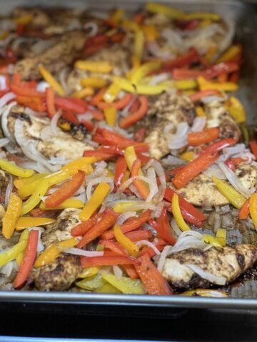 chicken, peppers and onion on sheet pan
