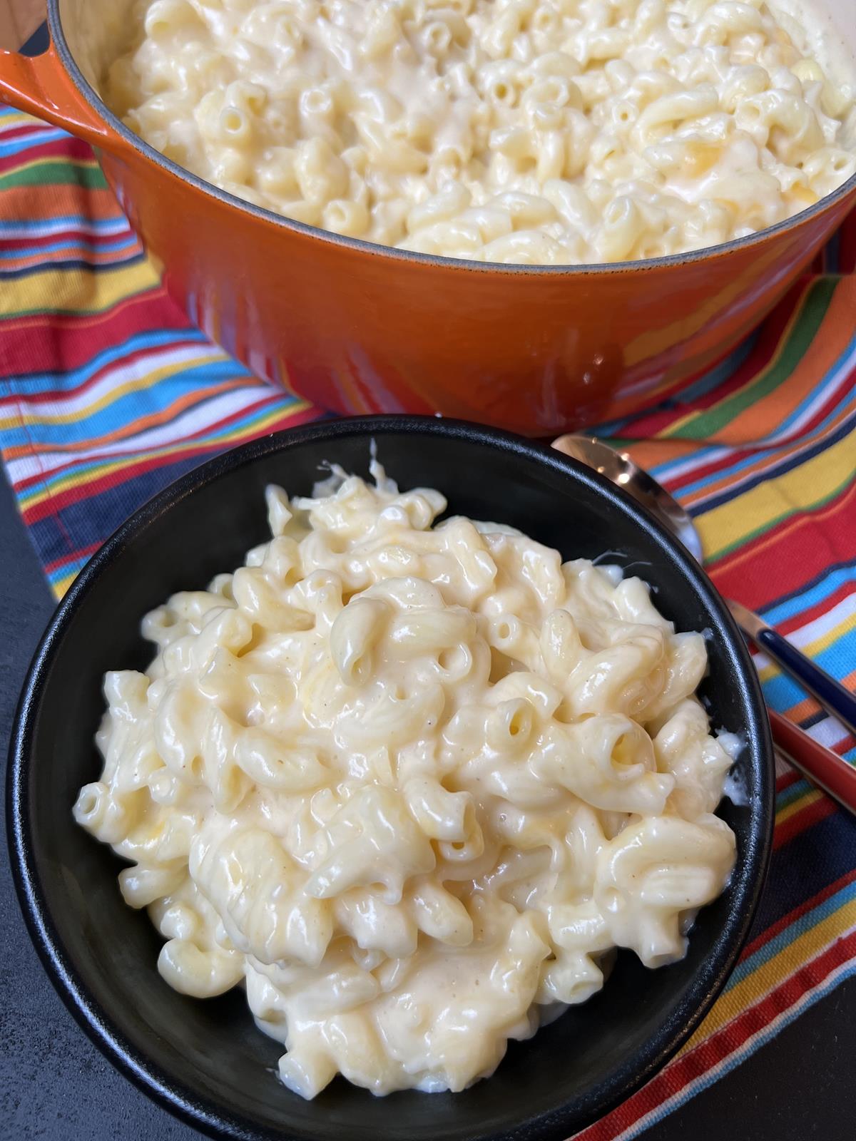 Martha Stewart Stove Top Mac and Cheese in black bowl on striped napkin