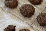 brownie cookies on cooling rack on white cloth
