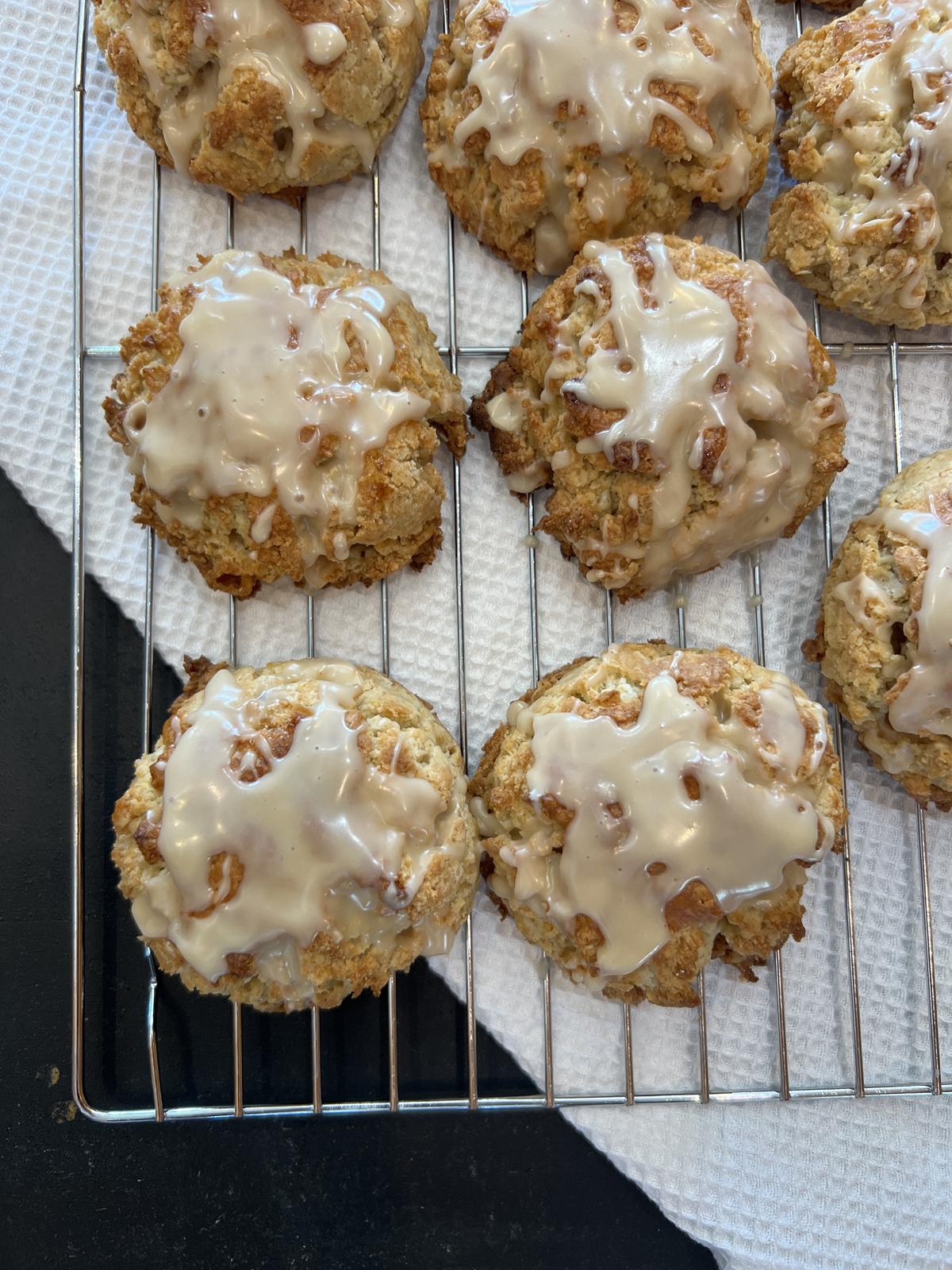 maple oatmeal scones on cooling rack on white cloth