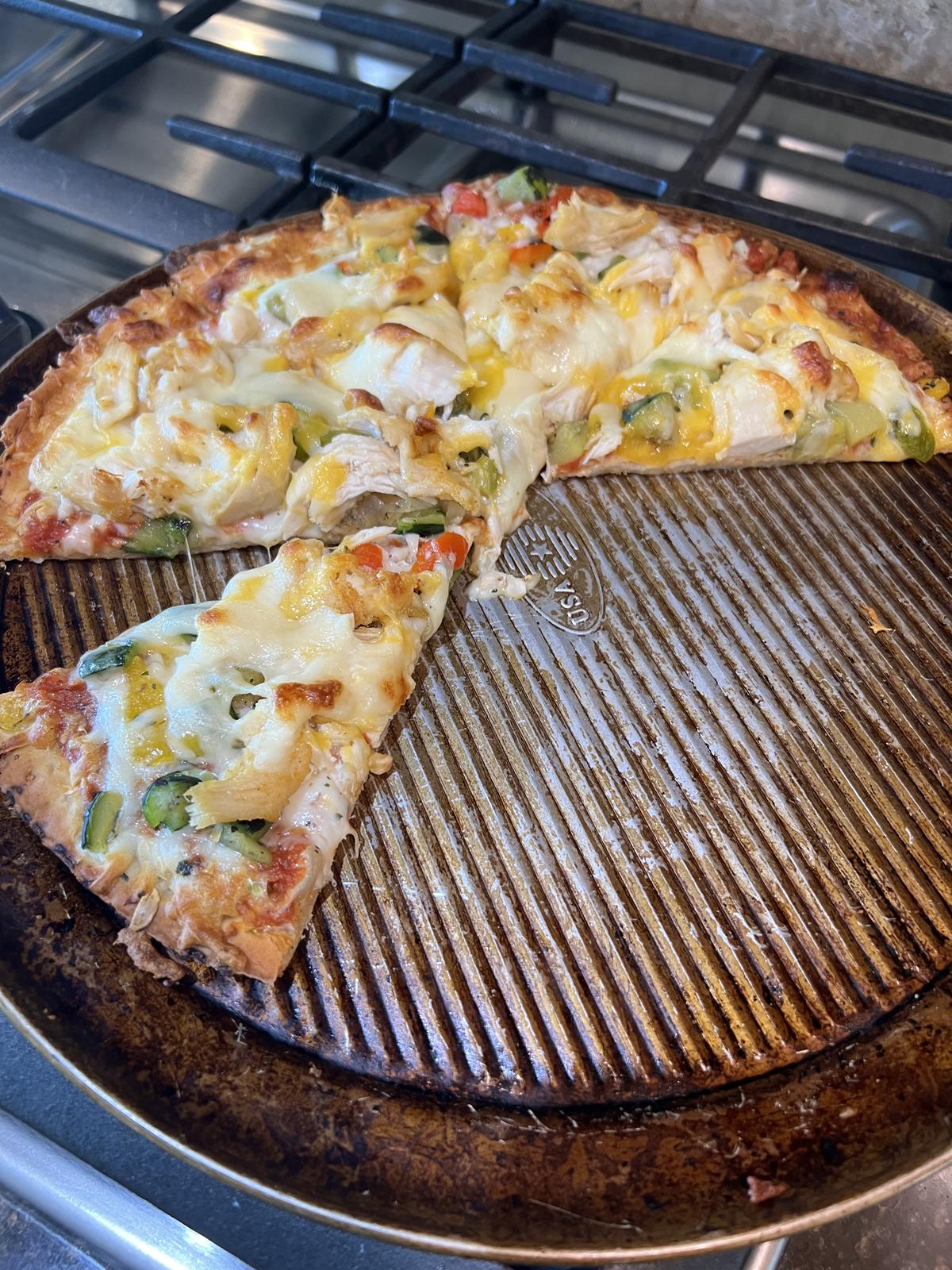 gluten free pizza on pizza pan