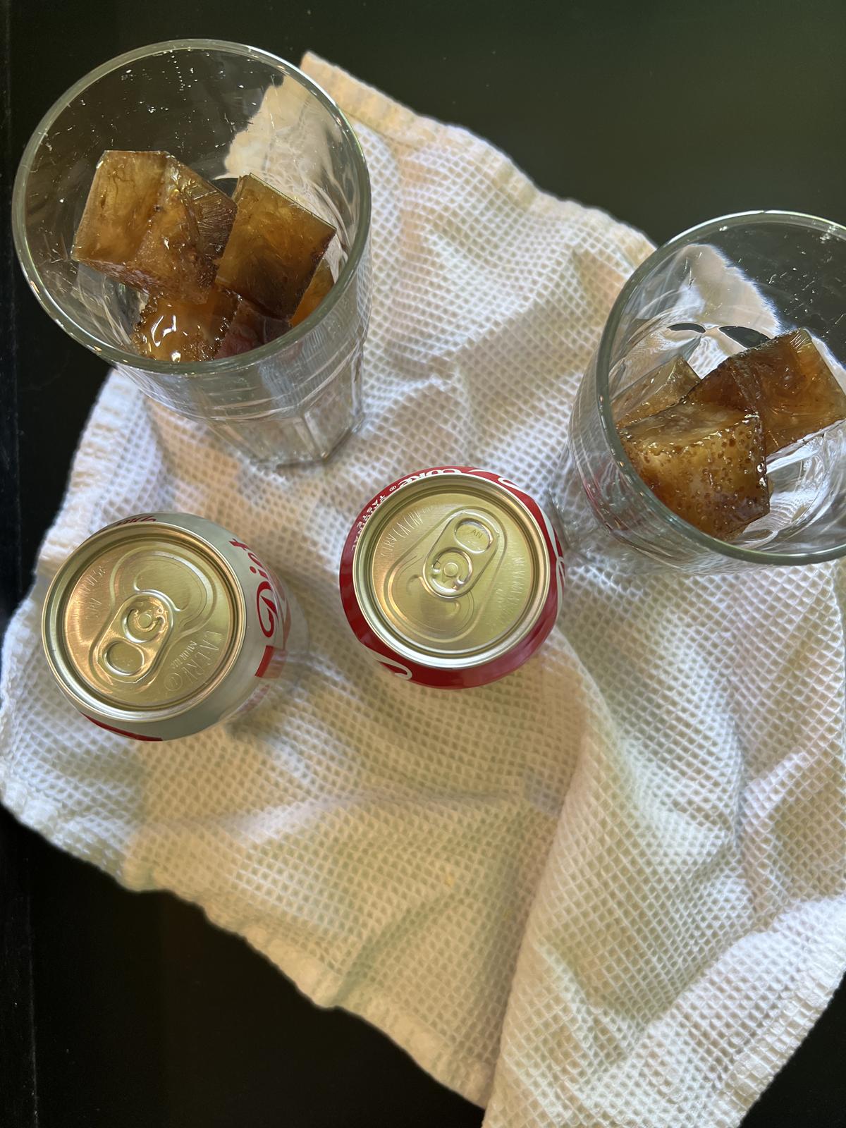 ice cubes in glasses on white napkin