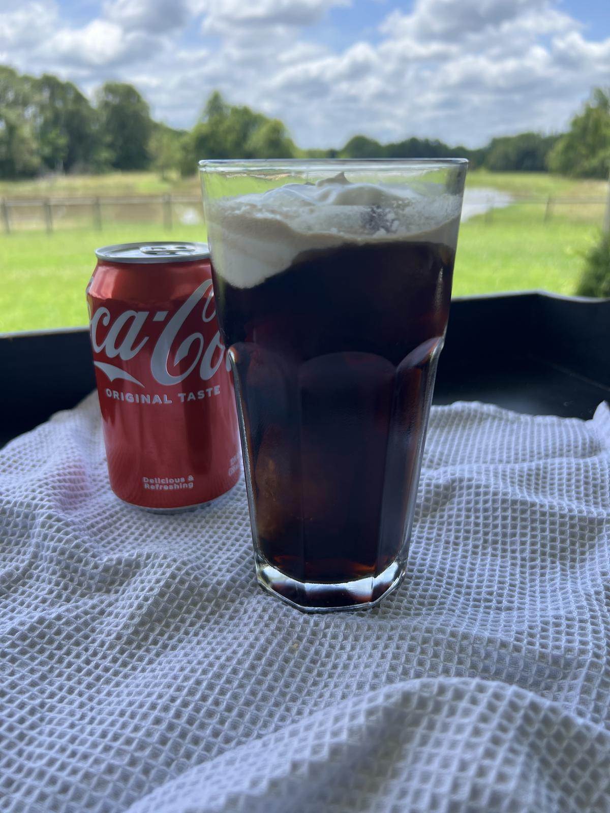 can of coke and float outside