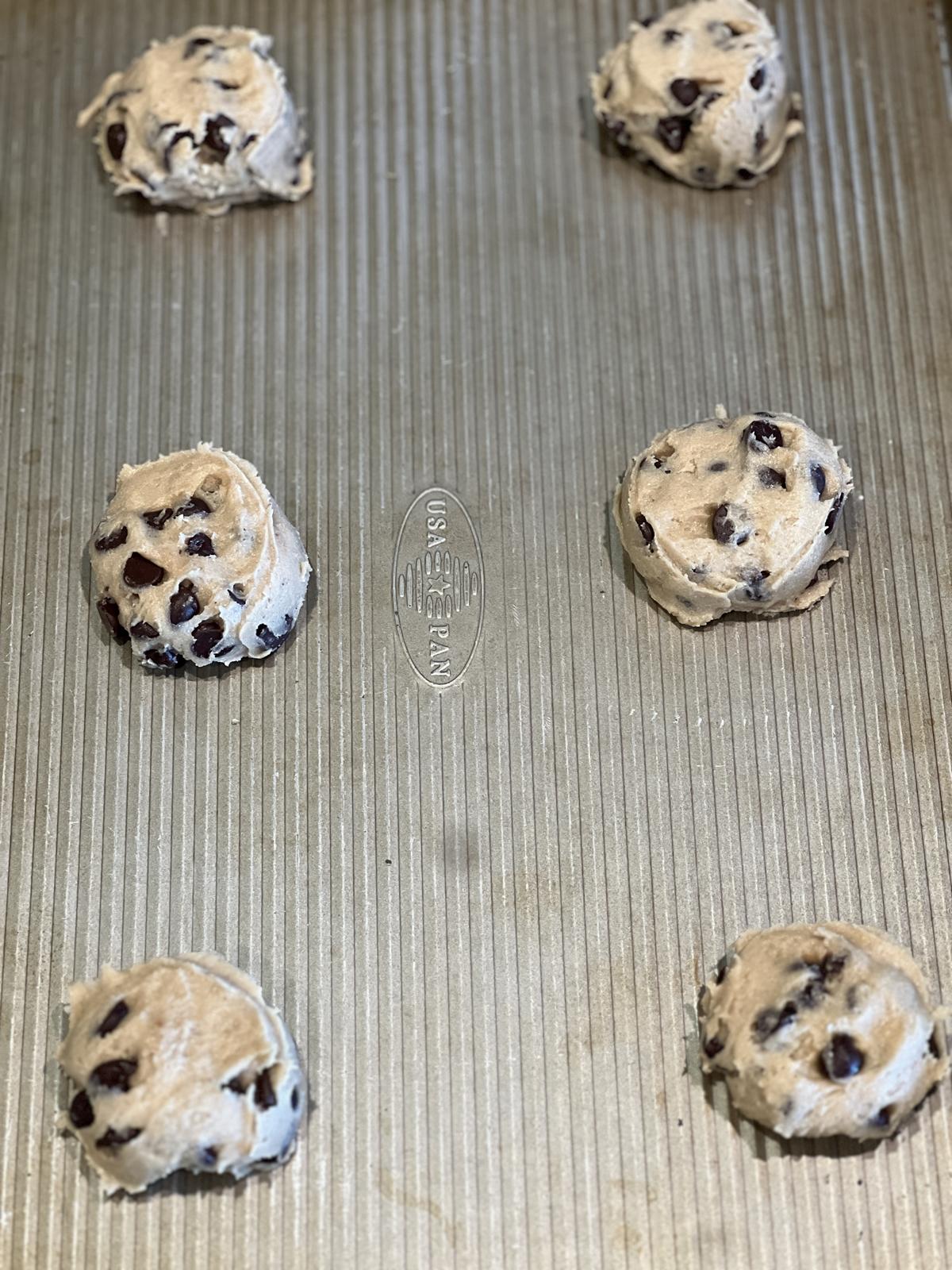 gluten free chocolate chip cookie dough on cookie sheet
