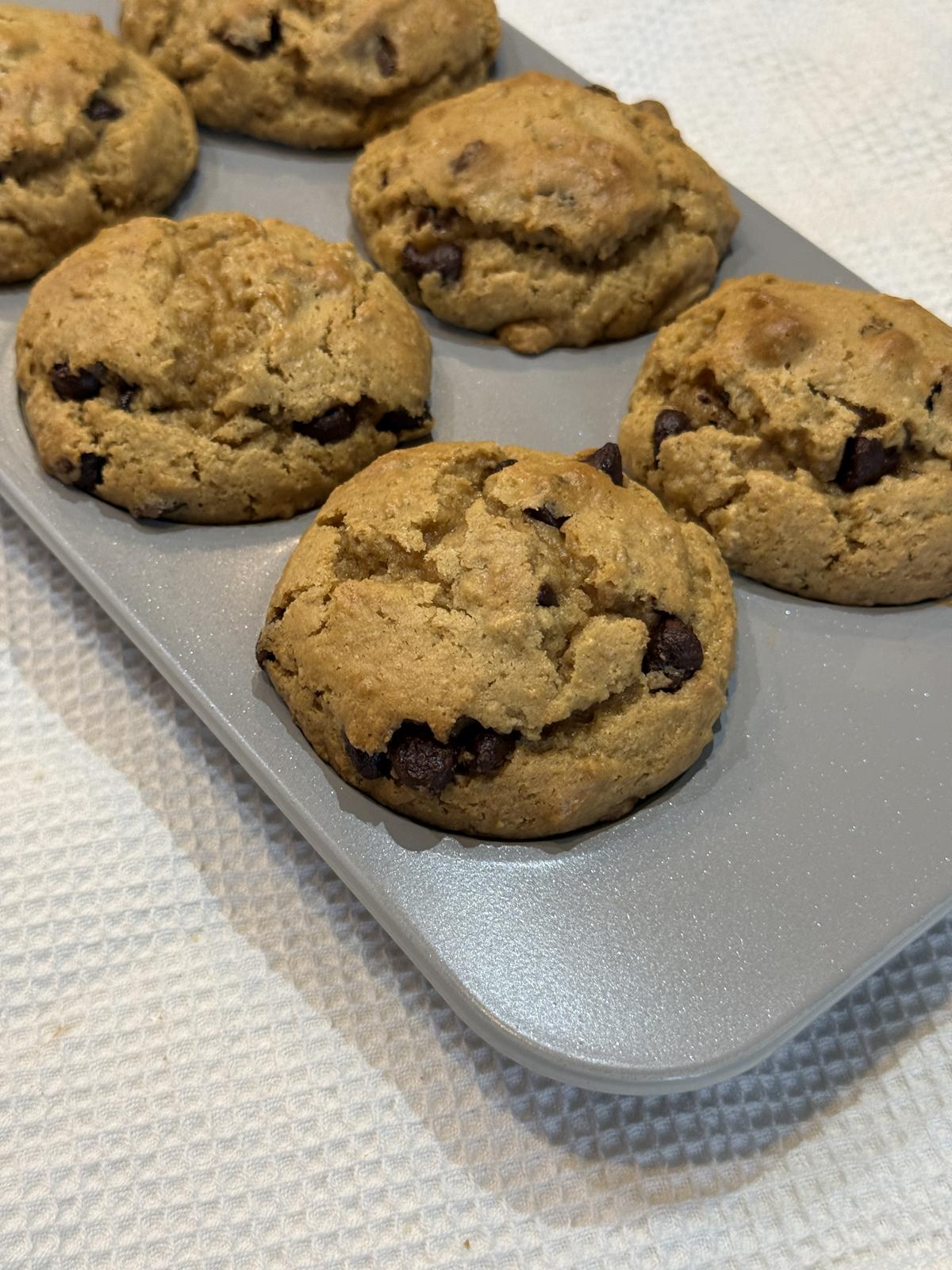 lLeftover Oatmeal Peanut Butter Muffins with Chocolate Chips in muffin pan