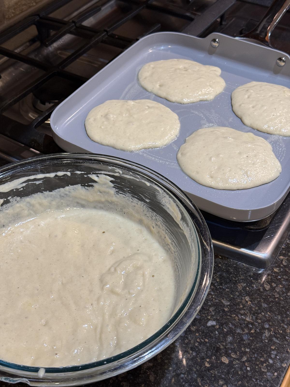 gluten free sourdough pancake batter and pancakes cooking on stove