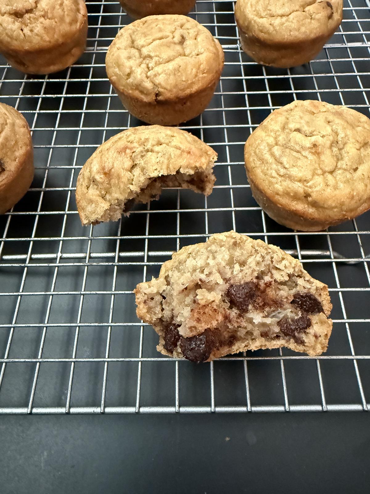 oatmeal banana muffins with chocolate chips on cooling rack