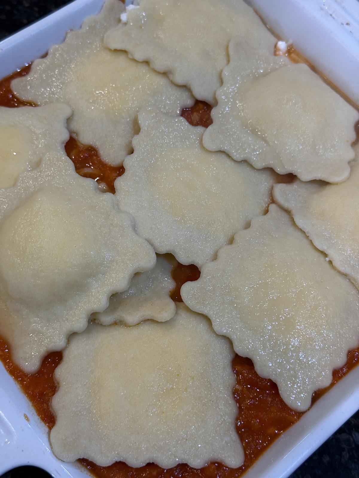 unbaked ravioli casserole unbaked in white casserole dish