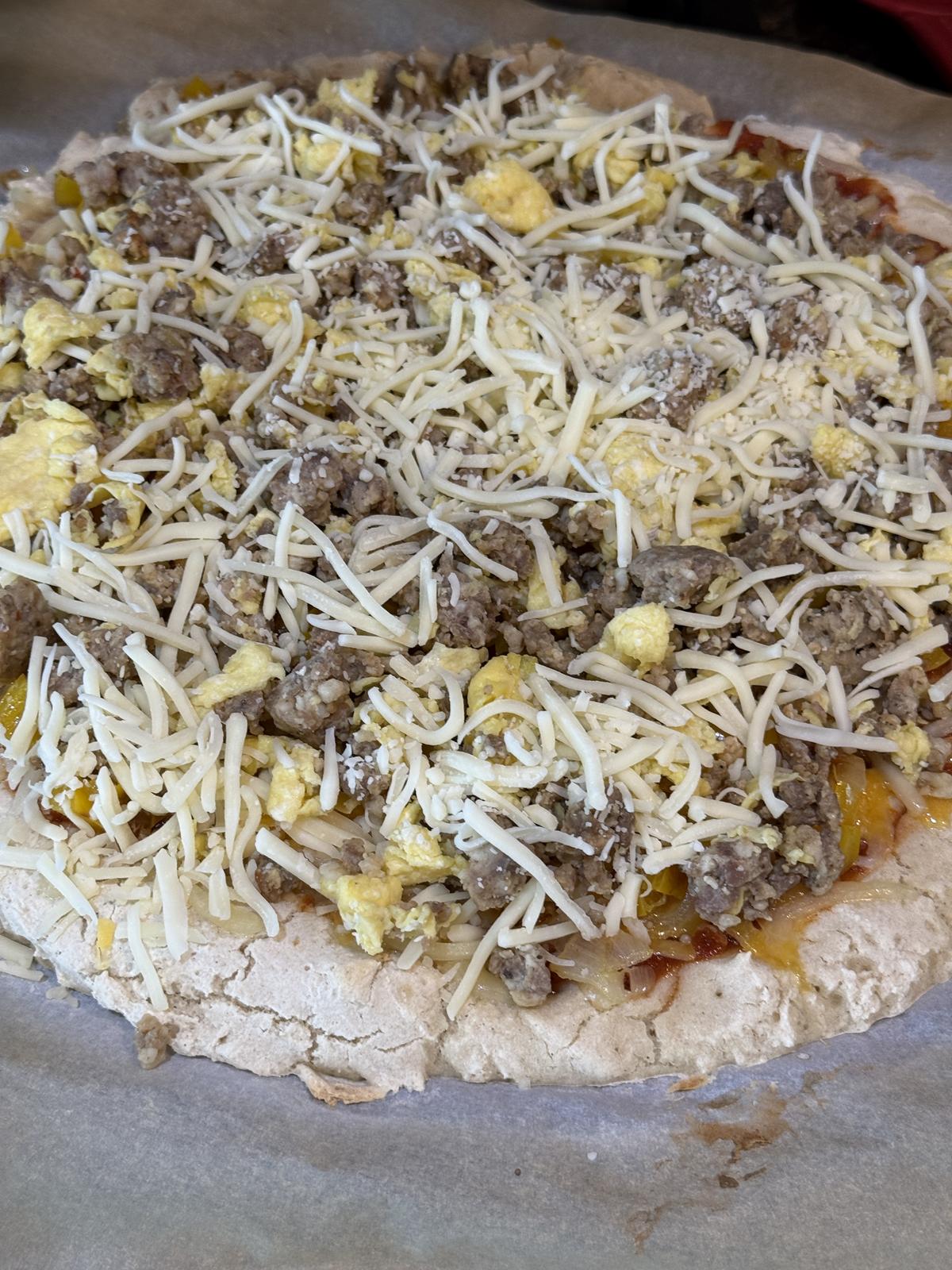 unbaked breakfast pizza