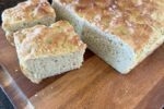 Gluten Free Sourdough Focaccia on cutting board on counter