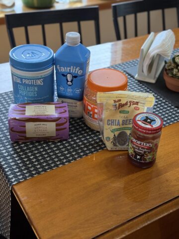 ingredients for peanut butter and jelly chia seed pudding on table