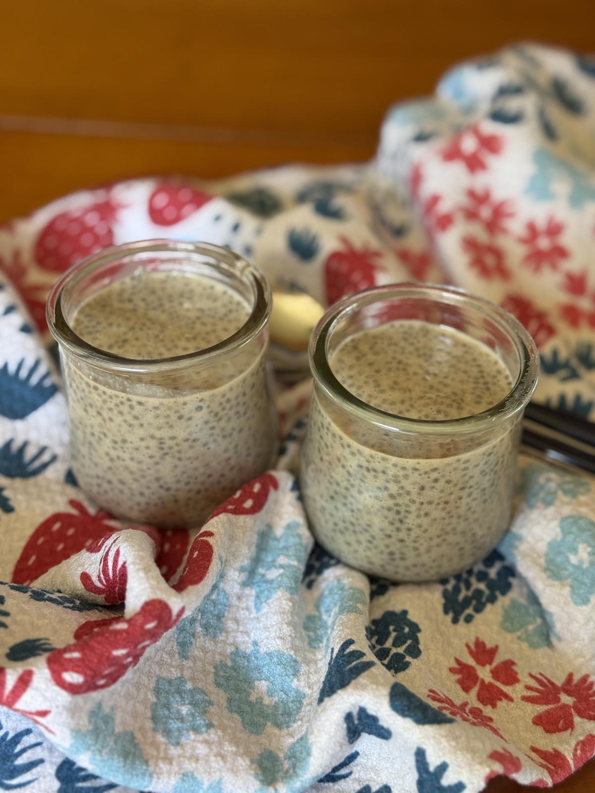 chia seed pudding in glass jars on red white and blue napkin