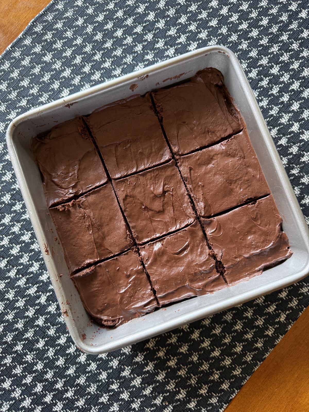 fudge cake brownies in metal pan cut into squares