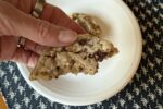 hand holding gluten free toffee pecan cookie recipe