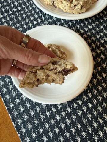 hand holding gluten free toffee pecan cookie recipe